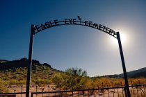 The ghostly wrought iron arch of Eagle Eye Cemetery, Arizona, usa — Stock Photo
