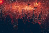Silhouettes of people at Correfoc Festival, Catalonia, Spain — стокове фото