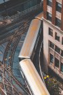 Aerial view of a train driving around a bend on the Loop, Chicago, Illinois, United States — Stock Photo