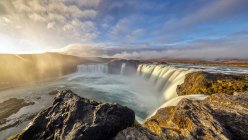 Scenic view of Sunrise at Godafoss waterfall, Bardalur, Iceland — стоковое фото