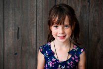 Portrait of a smiling girl in a summer dress — Stock Photo