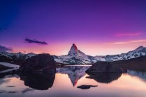Vista panorámica del paisaje de Matterhorn al atardecer, Suiza - foto de stock