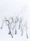 Top view of Spoons with flour on white background — Stock Photo