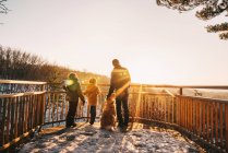 Father, two children and a dog looking at view, United States — Stock Photo