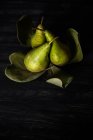 Closeup view of Pears arranged on leaves — Stock Photo