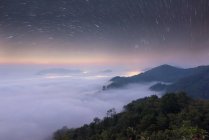 Aerial view of cloud carpet under the milky way at night, Thailand — Stock Photo