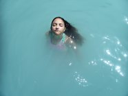 Girl swimming in a thermal bath, Bagni di Tivoli, Lazio, Italy — Stock Photo