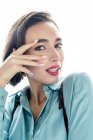 Portrait of a beautiful woman with her hand on her face — Stock Photo