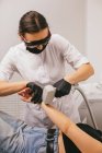 Woman having a Laser hair removal treatment in a beauty salon — Stock Photo
