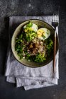 Bowl with healthy and organic food with green buckwheat, herbs and eggs — Stock Photo