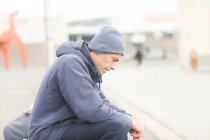 Man sitting on a bench thinking, Germany — Stock Photo