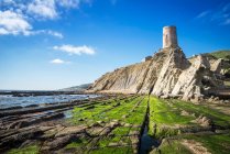Flysch with Guadalmesi Tower in the background, Tarifa, Cadiz, Andalusia, Spain — Stock Photo