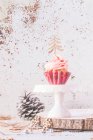 Cupcake with buttercream icing decorated with Christmas trees — Stock Photo