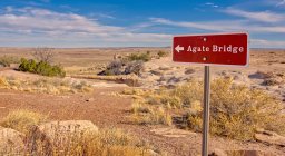 Sign to the Agate bridge, Petrified Forest National Park, Arizona, USA — Stock Photo