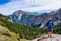 Man hiking in Dolomites, Fans-Sennes-Braies Nature Park, South Tyrol, Italy — стокове фото