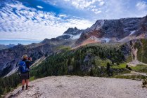 Man taking a photo in Dolomites, Fanes-Sennes-Braies Nature Park, South Tyrol, Italy — Stock Photo