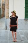 Portrait of a woman standing in the street, Majorca, Balearics, Spain — Stock Photo