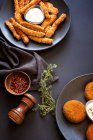Assorted fried appetizer selection on a table — Stock Photo
