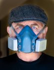 Portrait of man wearing filter mask — Stock Photo