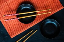 Table setting with chopsticks — Stock Photo