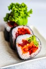 Close-up of Futomaki rolls on a plate — Stock Photo