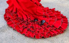 Primo piano delle nacchere su un orlo di abito da flamenco, Spagna — Foto stock