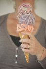 Woman holding a conceptual ice-cream — Stock Photo