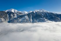 Горный пейзаж над облаками, Гаштайн, Зальцбург, Австрия — стоковое фото