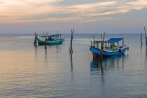 Two boats anchored at sea, Tanjung Pandan Beach, Indonesia — Stock Photo