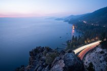 Highway along Lake Tahoe at Dusk, Cave Rock, Nevada, United States — Stock Photo