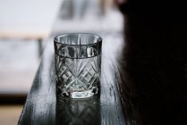 Glass of water on a bar — Stock Photo