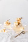Prosecco jelly, pear and granita topped with pear water and prosecco popcorn — Stock Photo