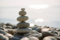 Stack of pebbles on beach — Stock Photo