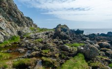Costa rocosa, Isla de Arran, Escocia, Reino Unido - foto de stock