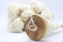 Making wool with a spindle — Stock Photo