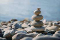 Stack of pebbles on beach — Stock Photo
