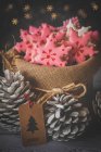 Christmas snowflake cookies in a hessian bag — Stock Photo