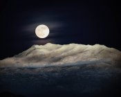 Beautiful night view of the moon and the milky way to the mountain — Stock Photo