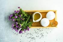 Spa and health concept with fresh lavender flowers on concrete background — Stock Photo