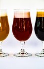 Glasses with different sorts of craft beer — Stock Photo