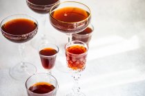 Red dry georgian wine in a variety of glasses wine on concrete background — Stock Photo