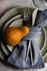 Overhead view of a pumpkin on a place setting for Thanksgiving — Stock Photo