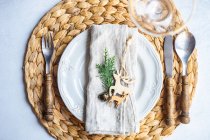 Overhead view of a Christmas place setting on a table — Stock Photo