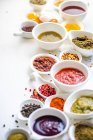 Overhead view of dried chilli, chilli paste and assorted herbs and spices — Stock Photo