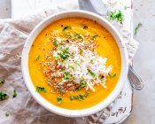 Pumpkin soup with cream and herbs. top view. — Stock Photo