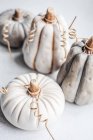 Ceramic pumpkins decorations on concrete surface — Stock Photo