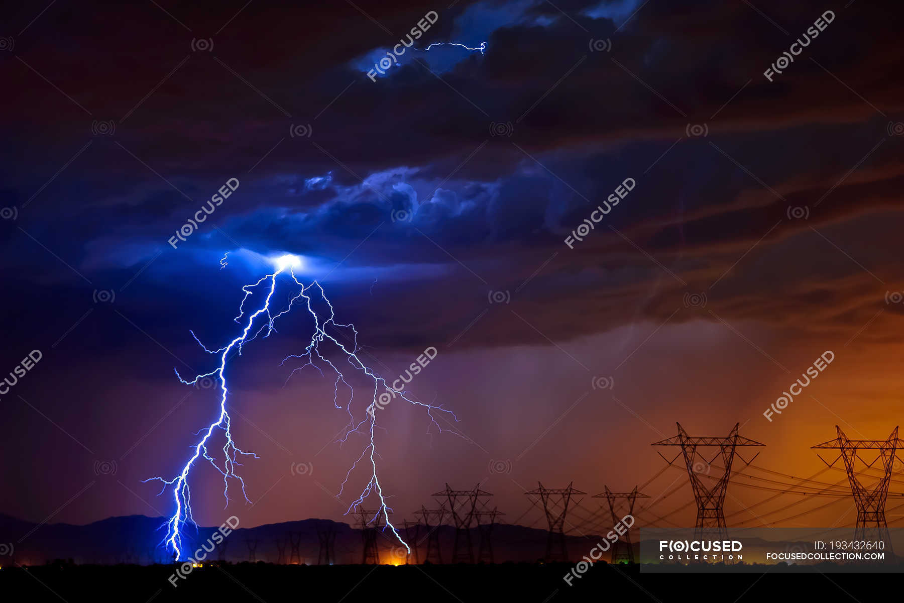 Lightning striking high voltage power lines, Tonopah, Arizona, America, USA  — majestic, natural phenomena - Stock Photo | #193432640