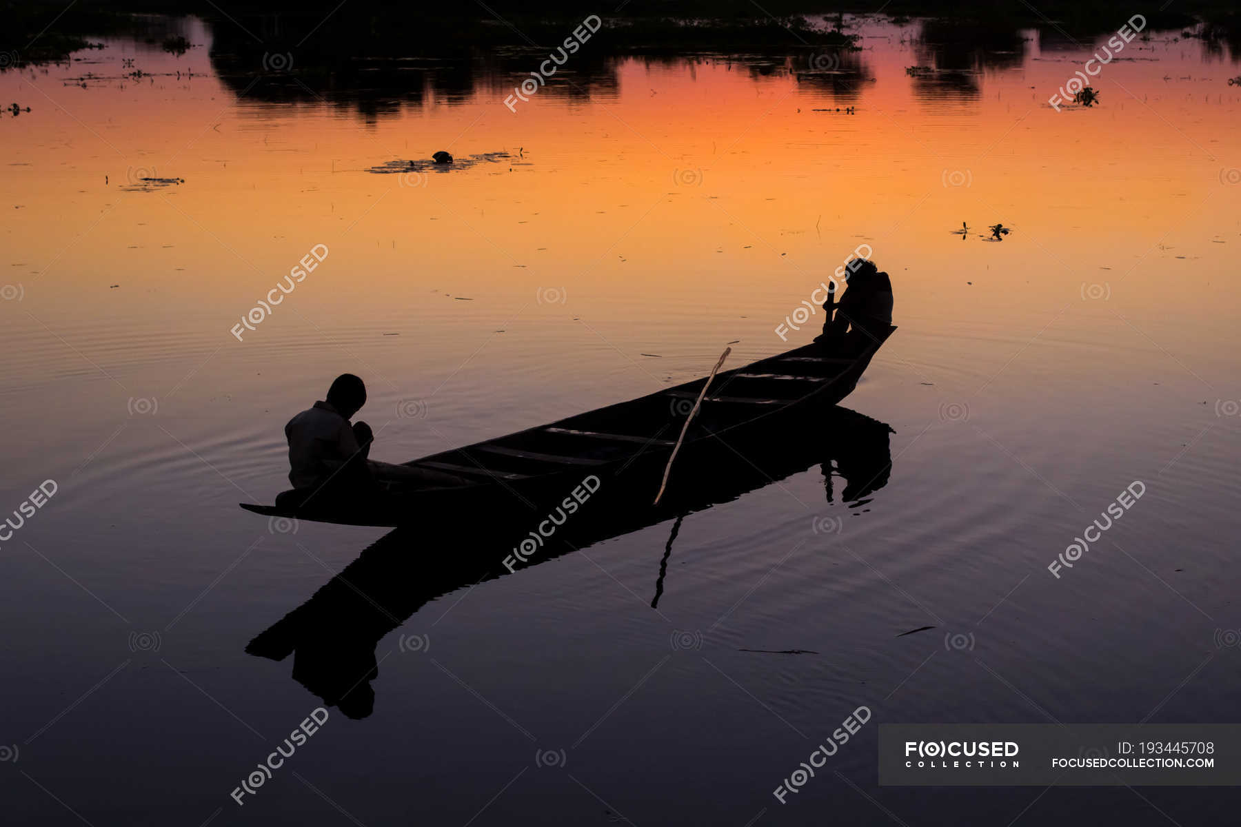 Silhouette of people in fishing boat at river — sea, nature - Stock ...