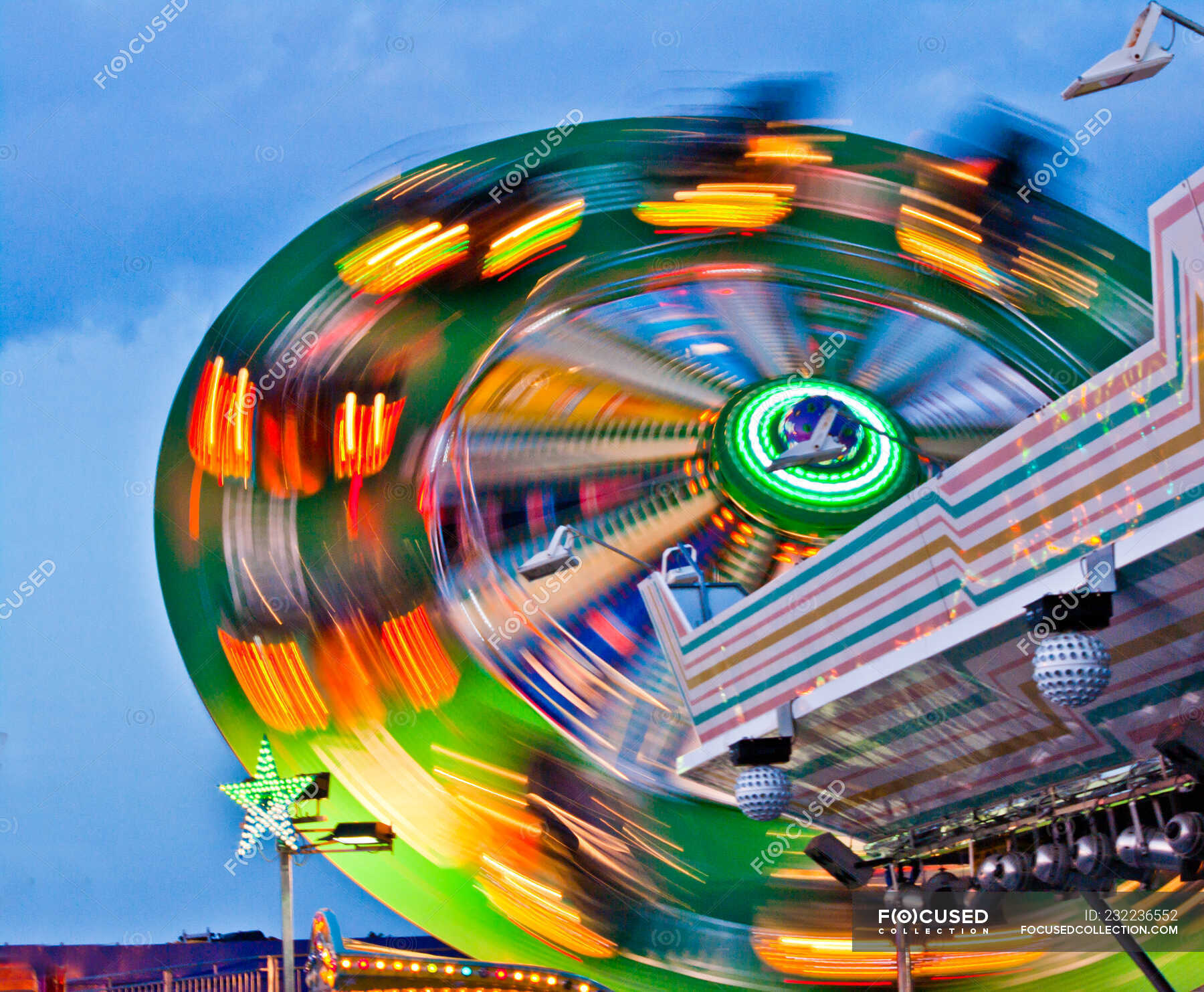 Carousel at carnival fun fair at night — Blurred Motion, Arts Culture