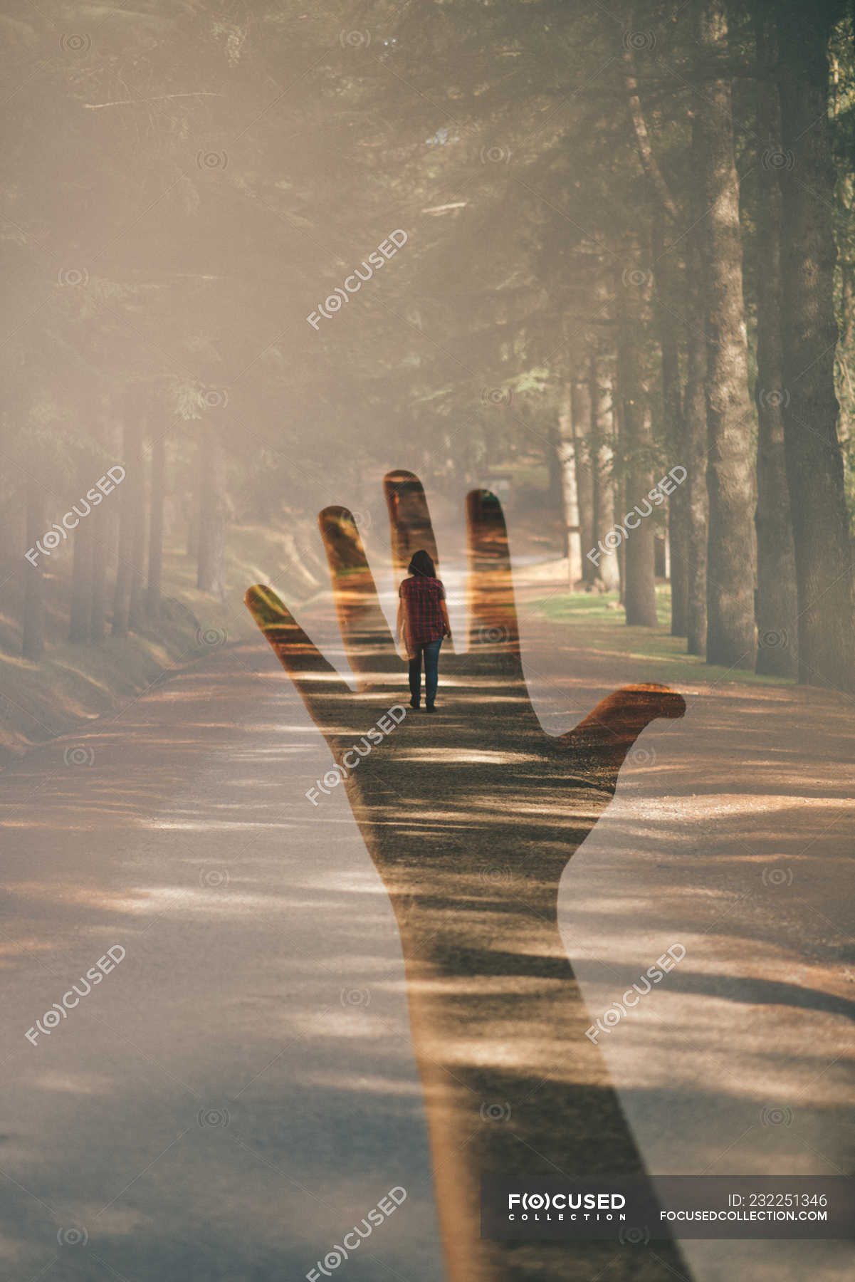 Double Exposure Of A Hand And A Woman Walking Away Female Caucasian Ethnicity Stock Photo 232251346